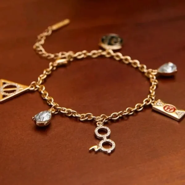 Pulsera Dorada Piedras 9 3/4 Lentes Harry Reliquias De La Muerte - Imagen 2